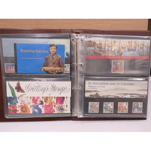 1555 - Full and well presented Album of Mint UK Presention packs, FDC's   some coin FDC's see photos.