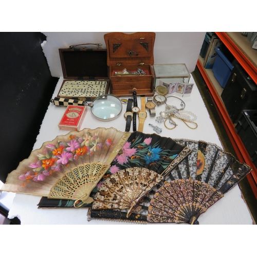 981 - Mixed Lot to include Jewellery box and costume contents, Dominoes,  Watches plus fans. See photos.