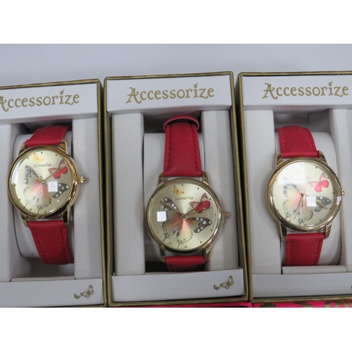 983 - Five ladies or Girls quartz watches with butterfly motif to the dial. Leather straps. All boxed and ... 