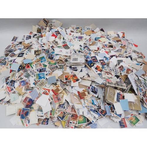 1574 - approx 2.9 Kilos of Loose Stamps and stamps on paper from UK and abroad. See photos.