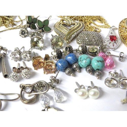 229A - Selection of 925 Silver jewellery to include pendants, Neckchains  and lots of pairs of Earrings. Se... 