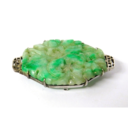 232A - Very Pretty carved Jade or Jadeite Brooch set in a 9ct White Gold Mount which measures approx 45 x 2... 