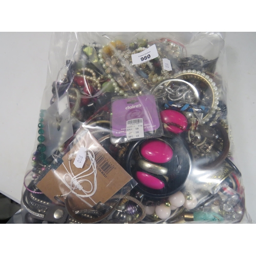 980 - Approx 5 Kilos of assorted costume Jewellery.  See photos.