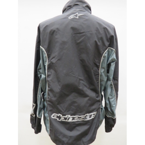 1745 - Alpine Stars Lightweight motorcycle shower jacket with zip and velcro fastening. In very good condit... 