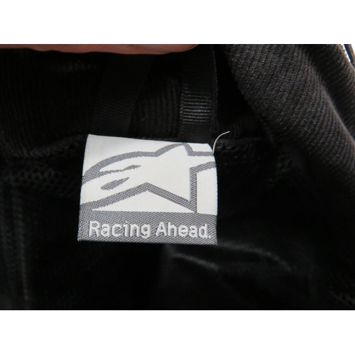 1745 - Alpine Stars Lightweight motorcycle shower jacket with zip and velcro fastening. In very good condit... 