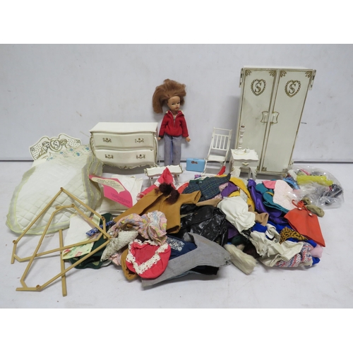 Vintage Cindy doll and a large selection of clothes and bedroom furinture.