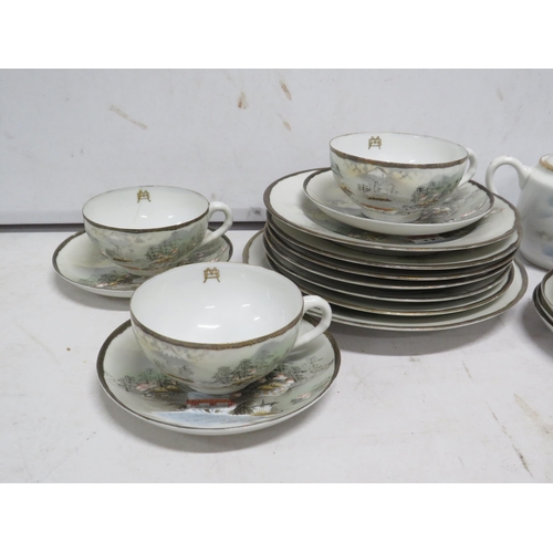 13 - Part Japanese egg shell china teaset.