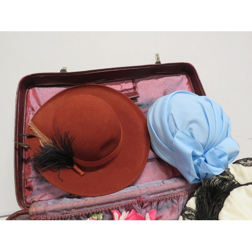 7 - Vintage Antler suitcase and various ladies vintage hats.