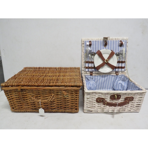 38 - 2 picnic hamper baskets one with plates and cutlery.