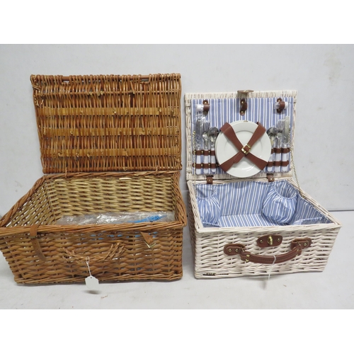 38 - 2 picnic hamper baskets one with plates and cutlery.