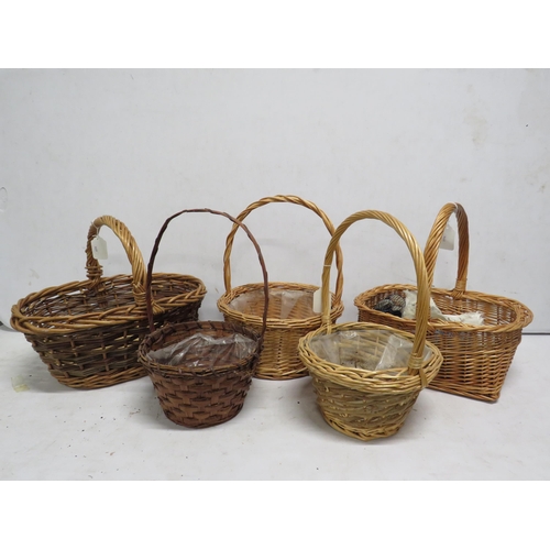 40 - 5 Wicker baskets with handles.