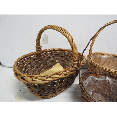 40 - 5 Wicker baskets with handles.