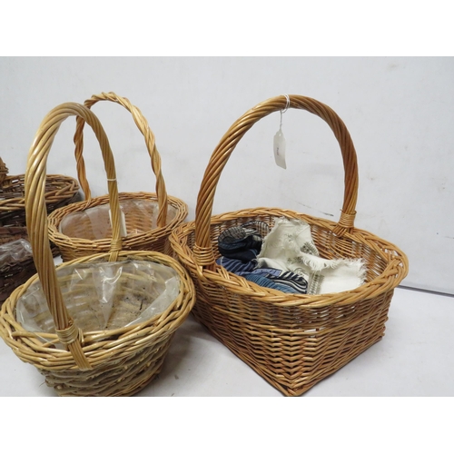 40 - 5 Wicker baskets with handles.