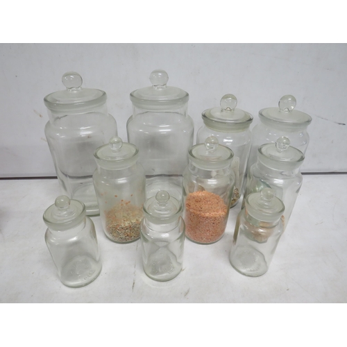 71 - 10 Vintage glass storage jars the tallest been 11