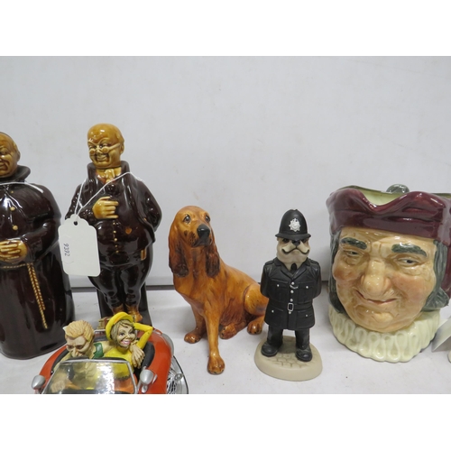 129 - Mixed lot to include dog figurines by Coalport, Sylvac and Doggie people plus a Royal Doulton toby j... 