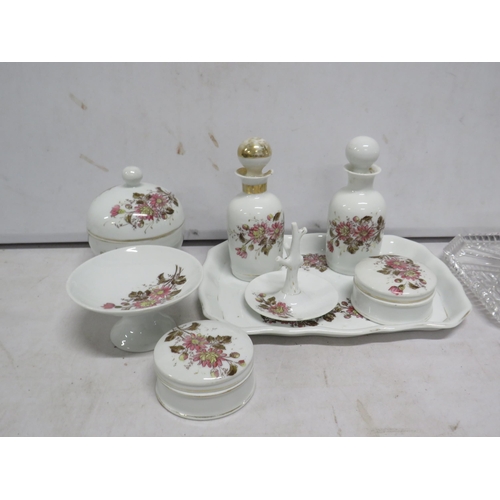 85 - 2 Vintage dressing tables sets one ceramic and one glass.