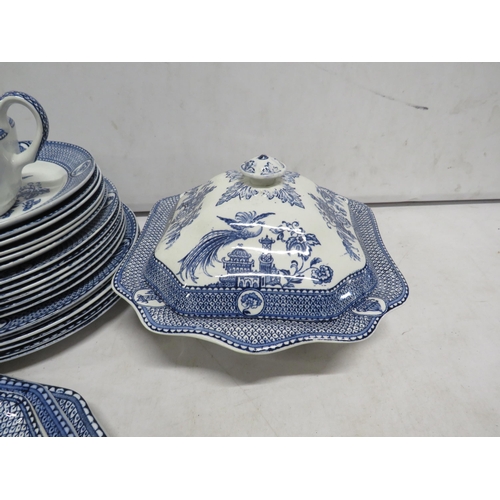 86 - S Ford and co vintage blue and white part dinnerset decorated with a bird of paradise.