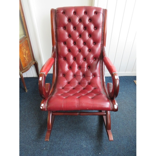 279 - Chesterfield style Rocking chair upholstered in Oxblood Leather. Clean and tidy condition. Seat heig... 