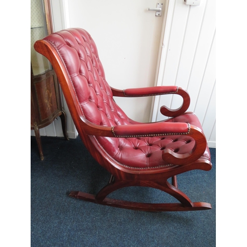 279 - Chesterfield style Rocking chair upholstered in Oxblood Leather. Clean and tidy condition. Seat heig... 