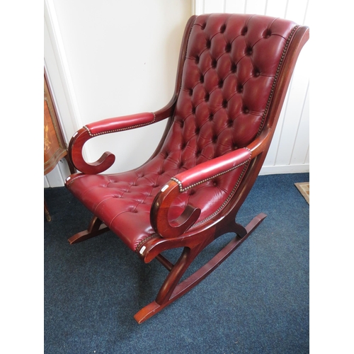 279 - Chesterfield style Rocking chair upholstered in Oxblood Leather. Clean and tidy condition. Seat heig... 