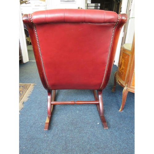 279 - Chesterfield style Rocking chair upholstered in Oxblood Leather. Clean and tidy condition. Seat heig... 