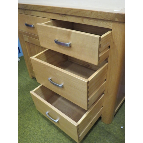 282 - Light Beechwood Cupboar with three drawers to right side, cupboard with drawer above to left.  H:32 ... 