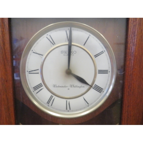 285 - Seiko Quartz Chiming wallclock. Will need new battery to run. See photo