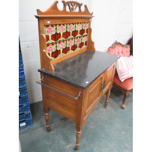 298 - Late 19th Century Tile Backed Wash Stand with Marble top. Two cupboard doors under. Raised on origin... 