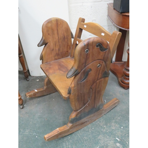 300 - Pleasing Childs Wooden Rocking Chair with Ducks head Carved decoration to sides.