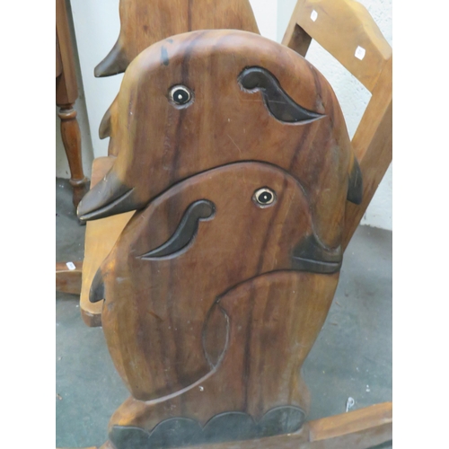 300 - Pleasing Childs Wooden Rocking Chair with Ducks head Carved decoration to sides.