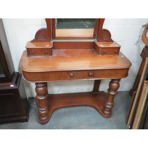 302 - Early 20th Century Mahogany dressing table with tilting mirror back. Raised on heavy turned legs it ... 