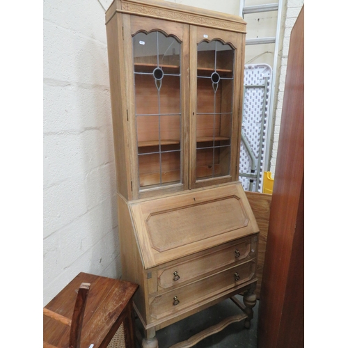 304 - Light Oak Bureau/Secretaire with Leaded Glass doors to top. Measures H;77 x W:29 x D:16 Inches.