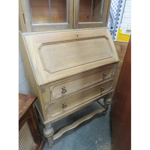 304 - Light Oak Bureau/Secretaire with Leaded Glass doors to top. Measures H;77 x W:29 x D:16 Inches.