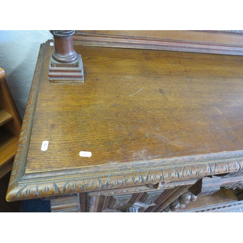 309 - Late 19th Century Imposing Oak Mirror Backed Dresser with Bevelled Glass full width Mirror. Decorate... 