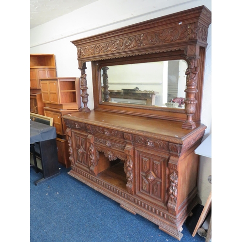 309 - Late 19th Century Imposing Oak Mirror Backed Dresser with Bevelled Glass full width Mirror. Decorate... 