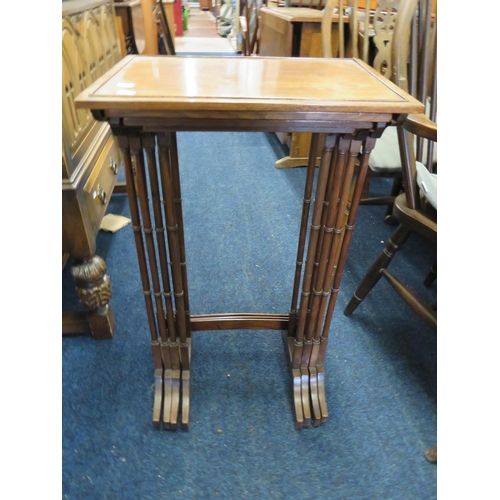 313 - Nicely made nest of Four Orieintal style mahogany stacking tables with faux bamboo style legs. Large... 