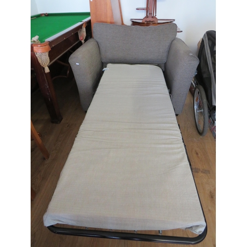 335 - Single pull out bed/chair in . See photos.  S2