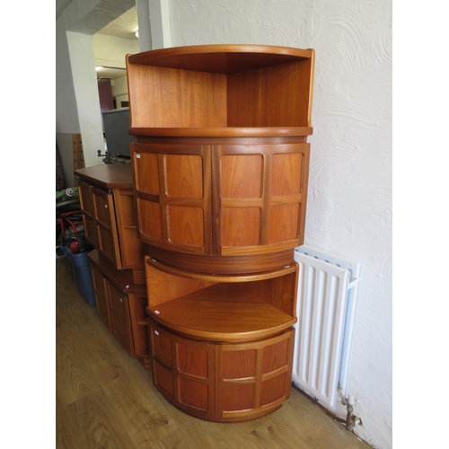 343 - Pair of Mid 20th Century Teak corner quadrant cupboard units by 'Nathan'.   Each H:29 x W:25 x D:18 ... 