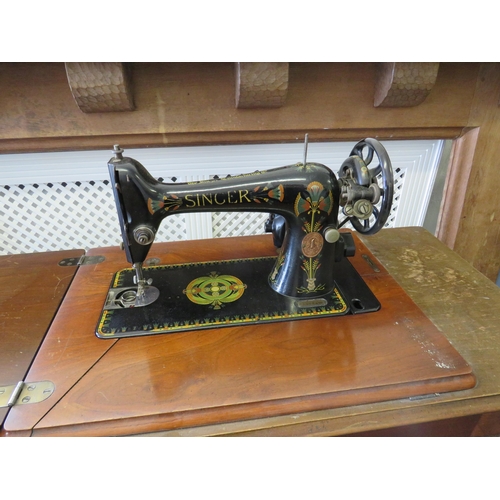 347 - Vintage Treadle Sewing maching base with original Singer sewing machine. Cast iron base.   H:29 x W:... 