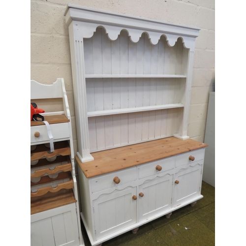 349 - Pine three drawer dresser with plate rack above. Raised on Turned Bun feet it measures H:80 x W:53 x... 