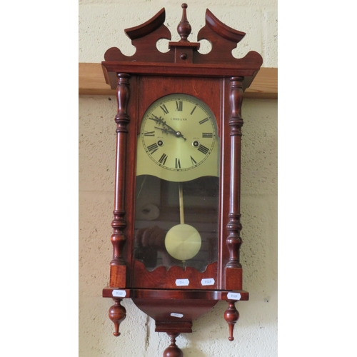 356 - Reproduction mahogany cased wallclock by C. Wood & Sons in running order, measures approx 33 inches ... 