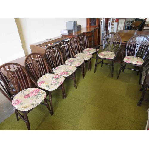 361 - Six Dark wood wheelback dining chairs with two carvers. See photos.