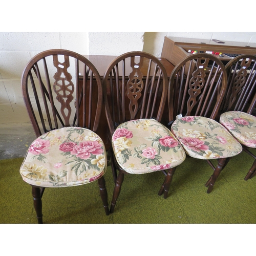 361 - Six Dark wood wheelback dining chairs with two carvers. See photos.