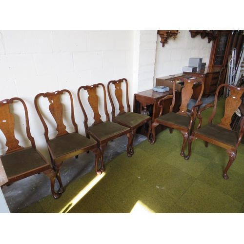 362 - Four Dark wood dining chairs with two carvers. See photos