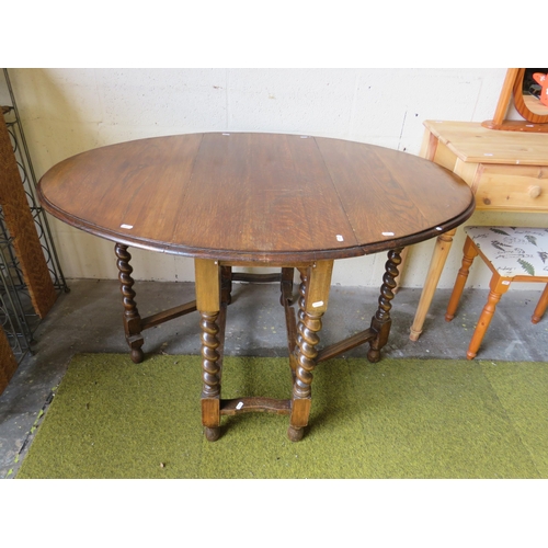 365 - Vintage Early 20th Century Oak Drop leaf table with barley twist legs.  29 inches tall. See photos.