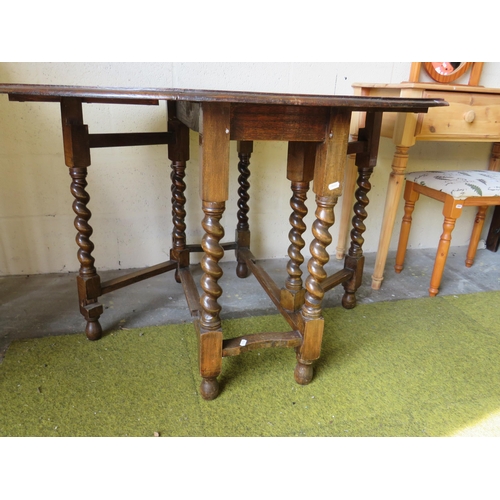 365 - Vintage Early 20th Century Oak Drop leaf table with barley twist legs.  29 inches tall. See photos.