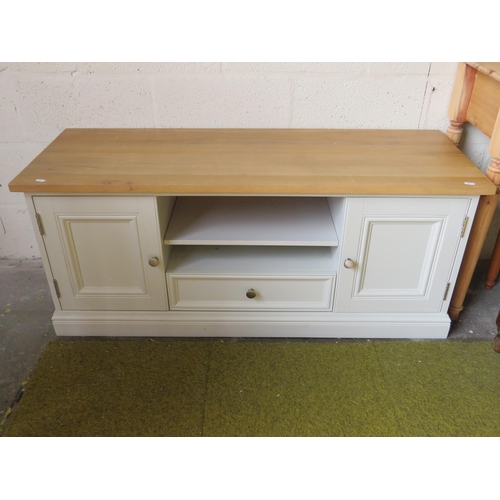 366 - Low painted cupboard with beech top, soft close lower drawer. Raised on a plinth base it measures H:... 