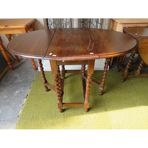 369 - Vintage Oak Drop leaf table with barley twist legs. H:30 inches. See photos.