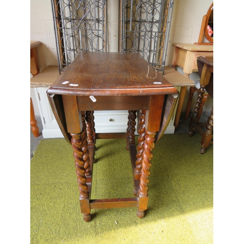 369 - Vintage Oak Drop leaf table with barley twist legs. H:30 inches. See photos.