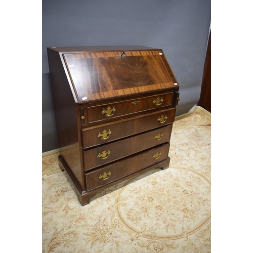 426 - Reproduction bureau with leather insert to top.  See photos.  S2